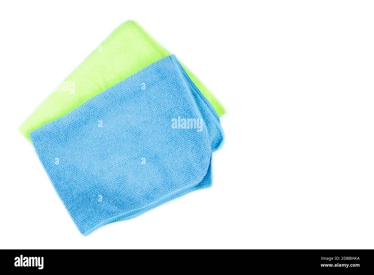 Microfiber cleaning cloth of blue and green on isolated white Stock Photo