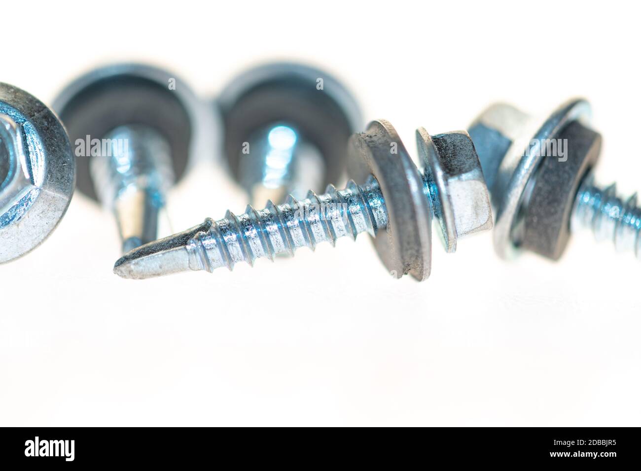 sheet metal and stainless steel screws together with hex nuts Stock Photo Alamy