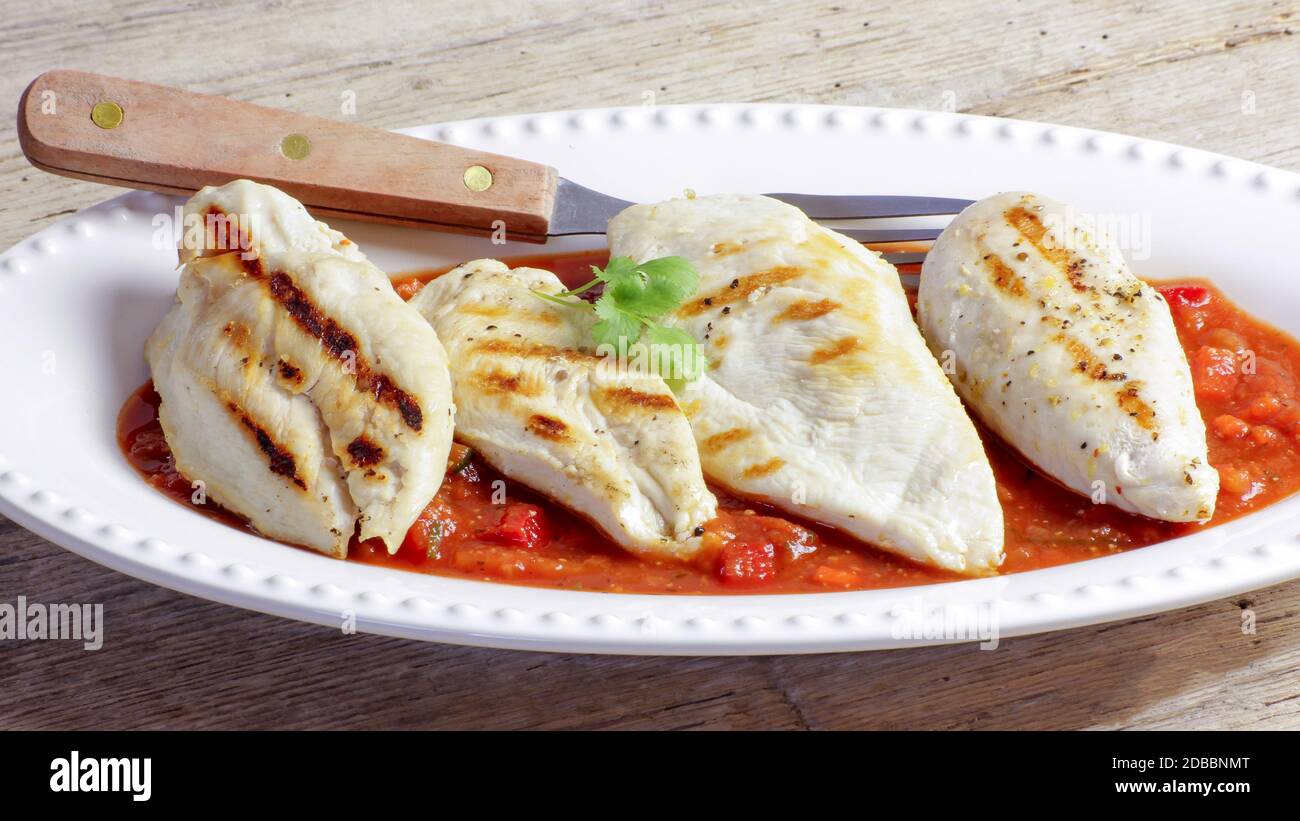 cooked chicken fillet Stock Photo - Alamy