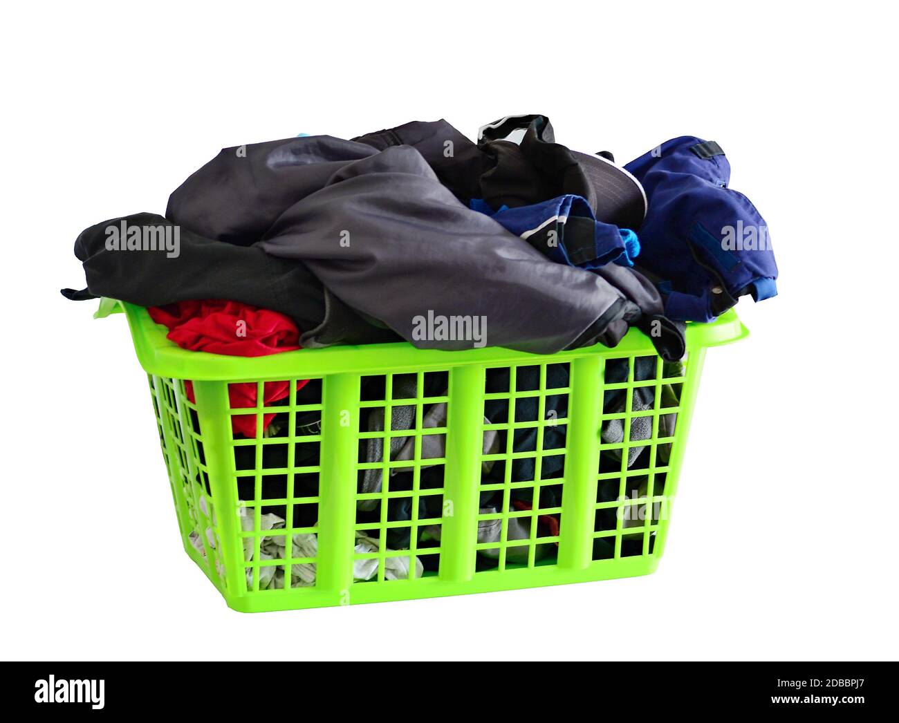 Green basket full of fresh washed laundry isolated on white background. Stock Photo