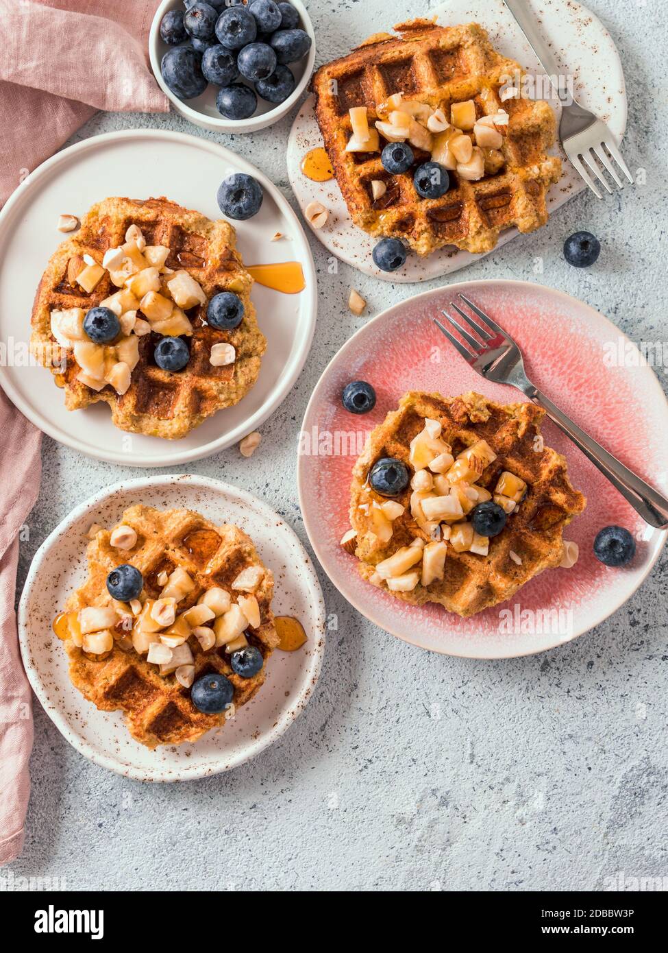 Easy healthy gluten free oat waffles with copy space. Plates with