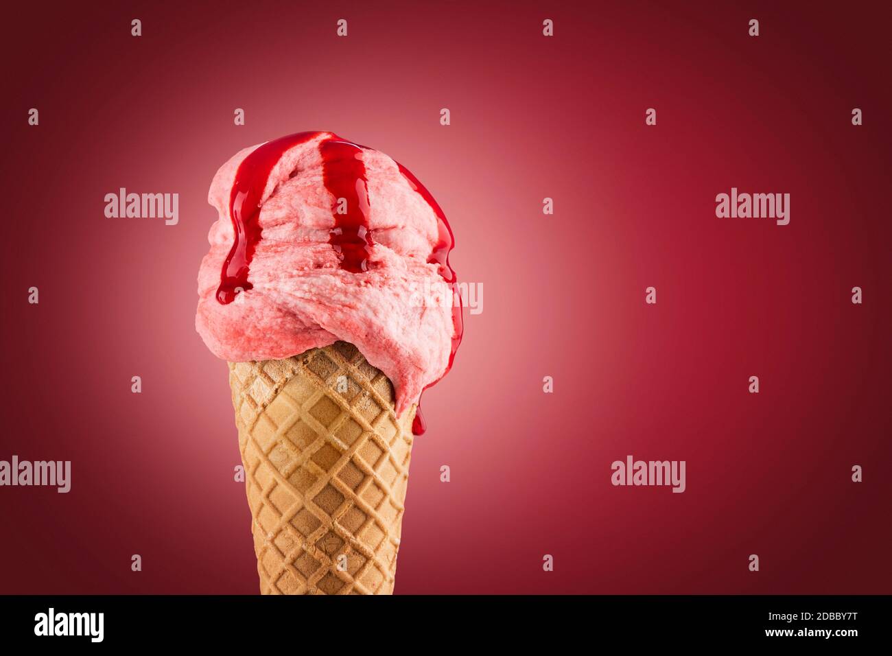 Strawberry ice cream cone on purple background Stock Photo - Alamy