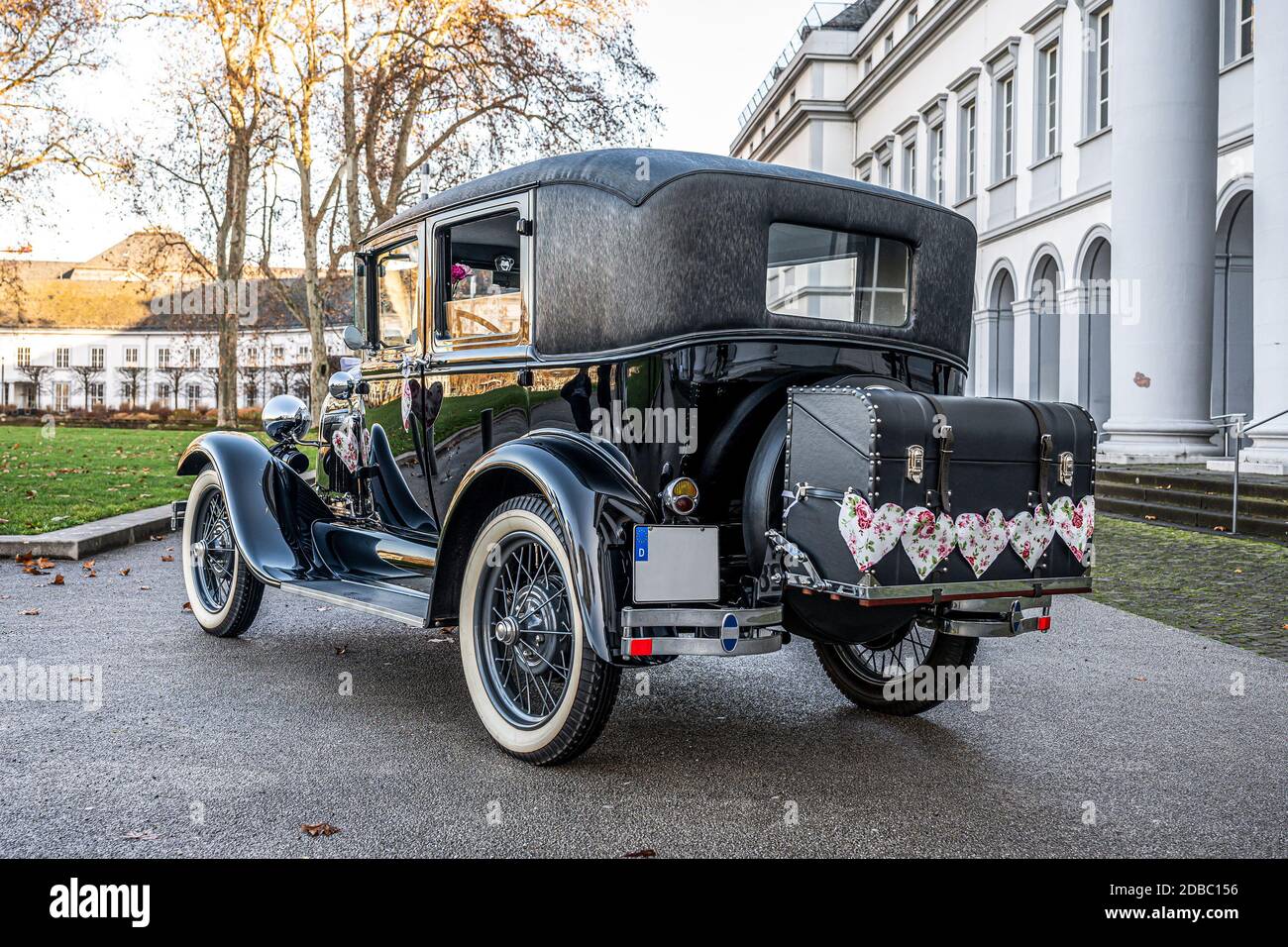 Wedding Couple in old antique Oldtimer Car 1928 during a Wedding 