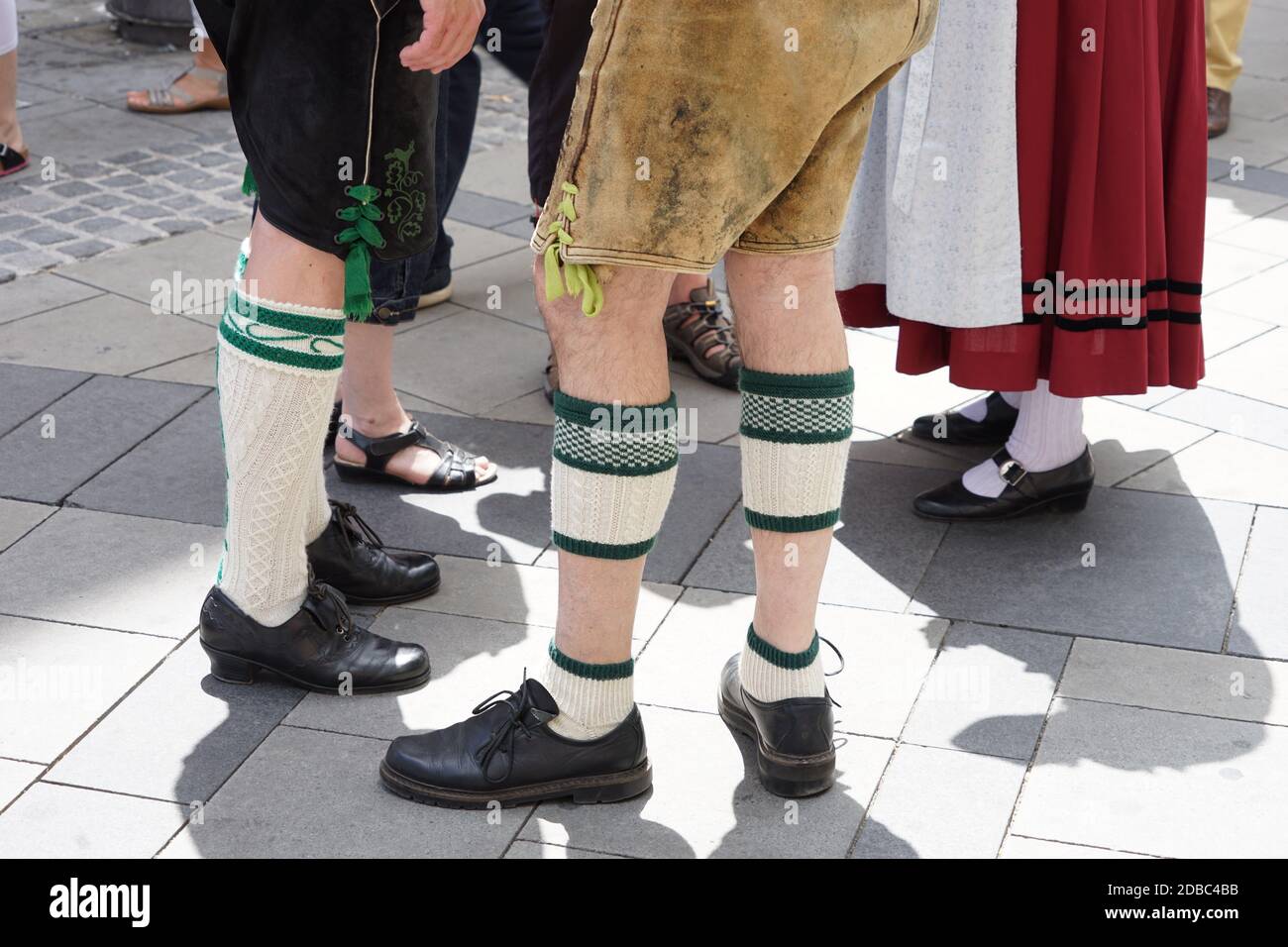 Bavarian dress (Dirndl and Lederhose) and traditional dancing Stock Photo