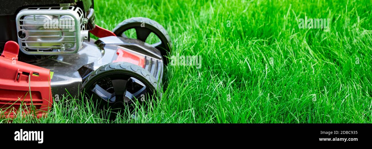 lawn mower on the grass Stock Photo