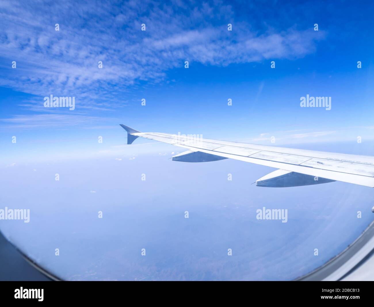 The looking at aircraft wing view from windows Stock Photo - Alamy