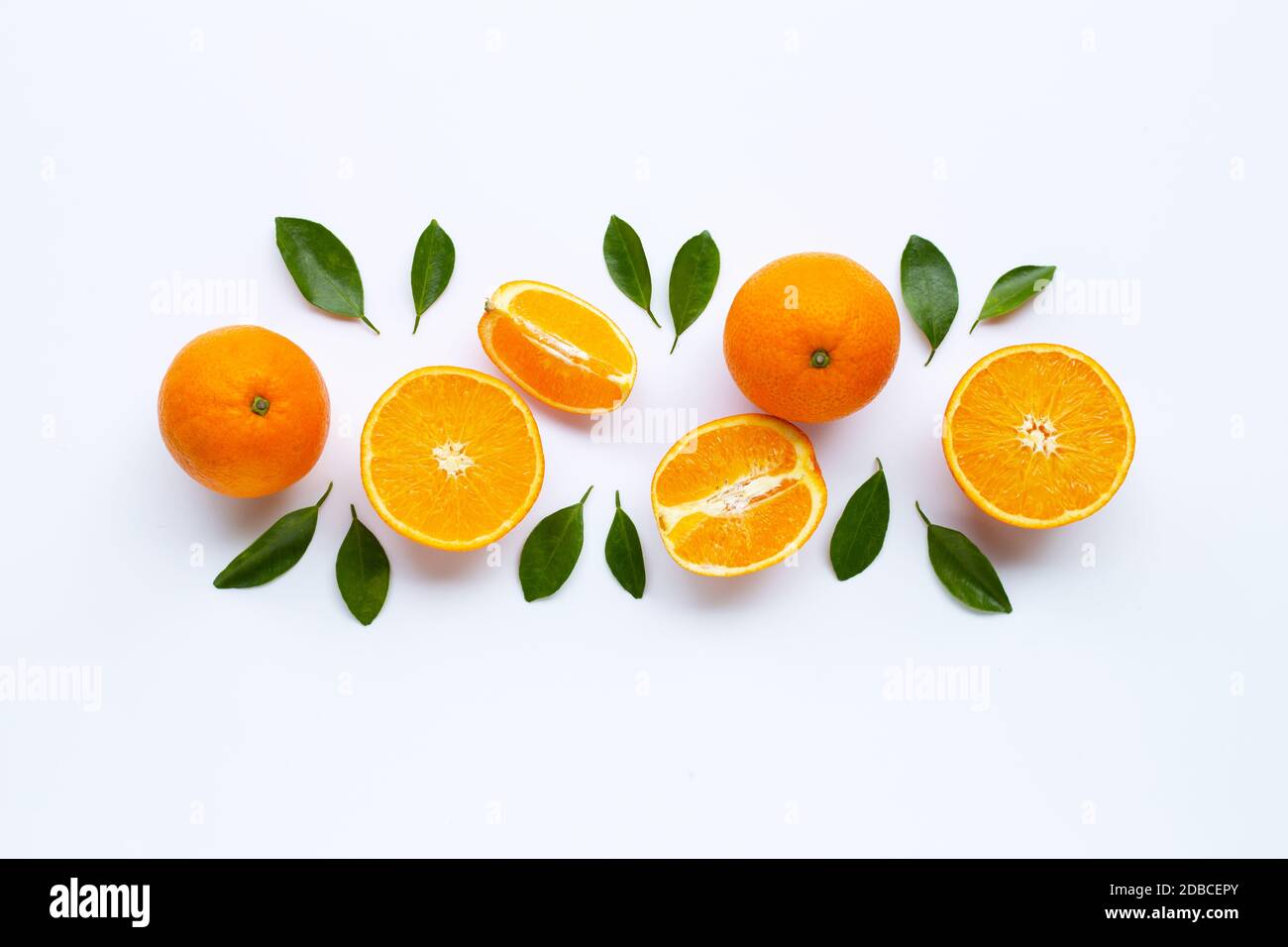 High vitamin C. Fresh orange citrus fruit with leaves isolated on white