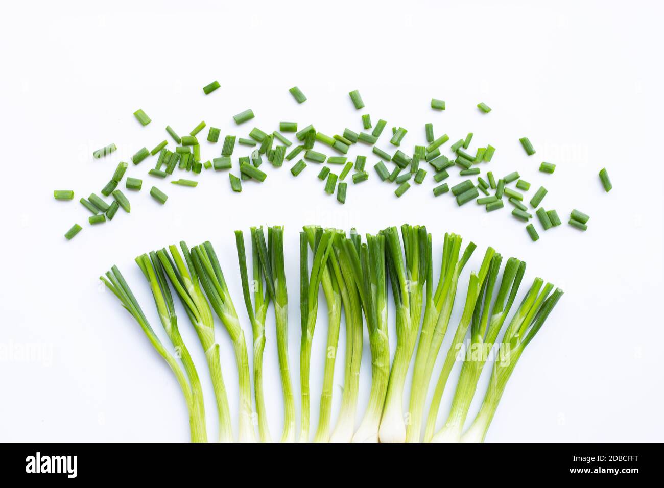 Green onions isolated on white background Stock Photo - Alamy