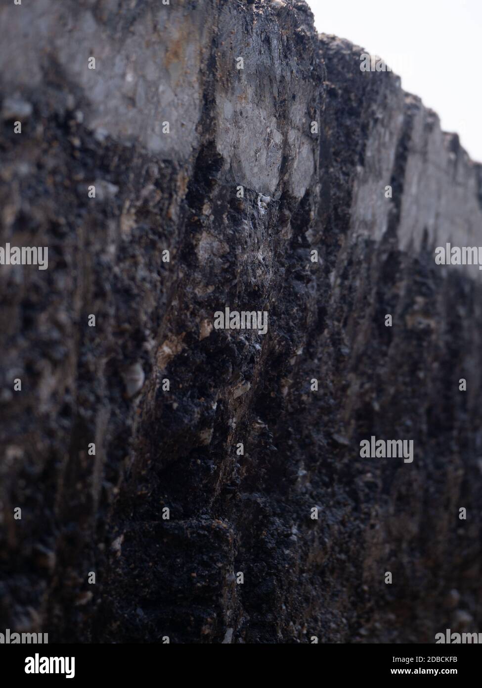 installing concrete drains on the side of the road Stock Photo Alamy