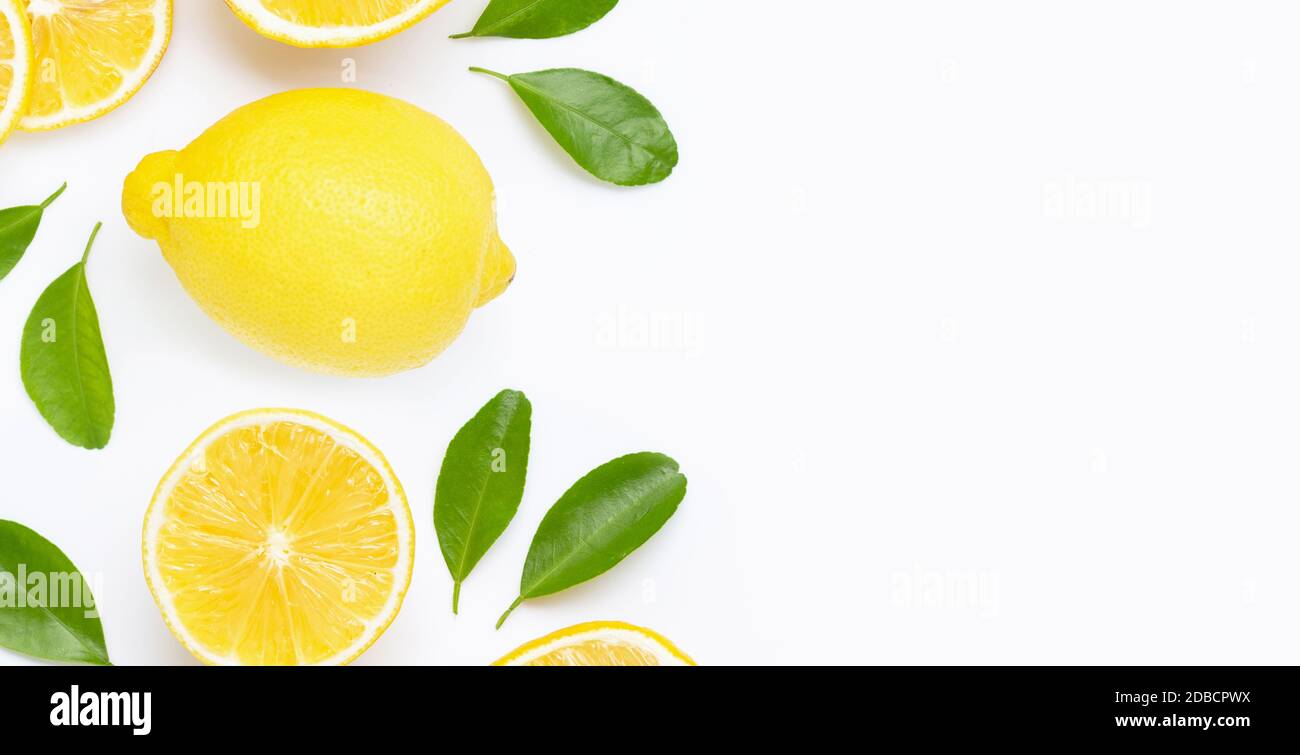 Frame made of fresh lemon and slices with leaves isolated on white ...