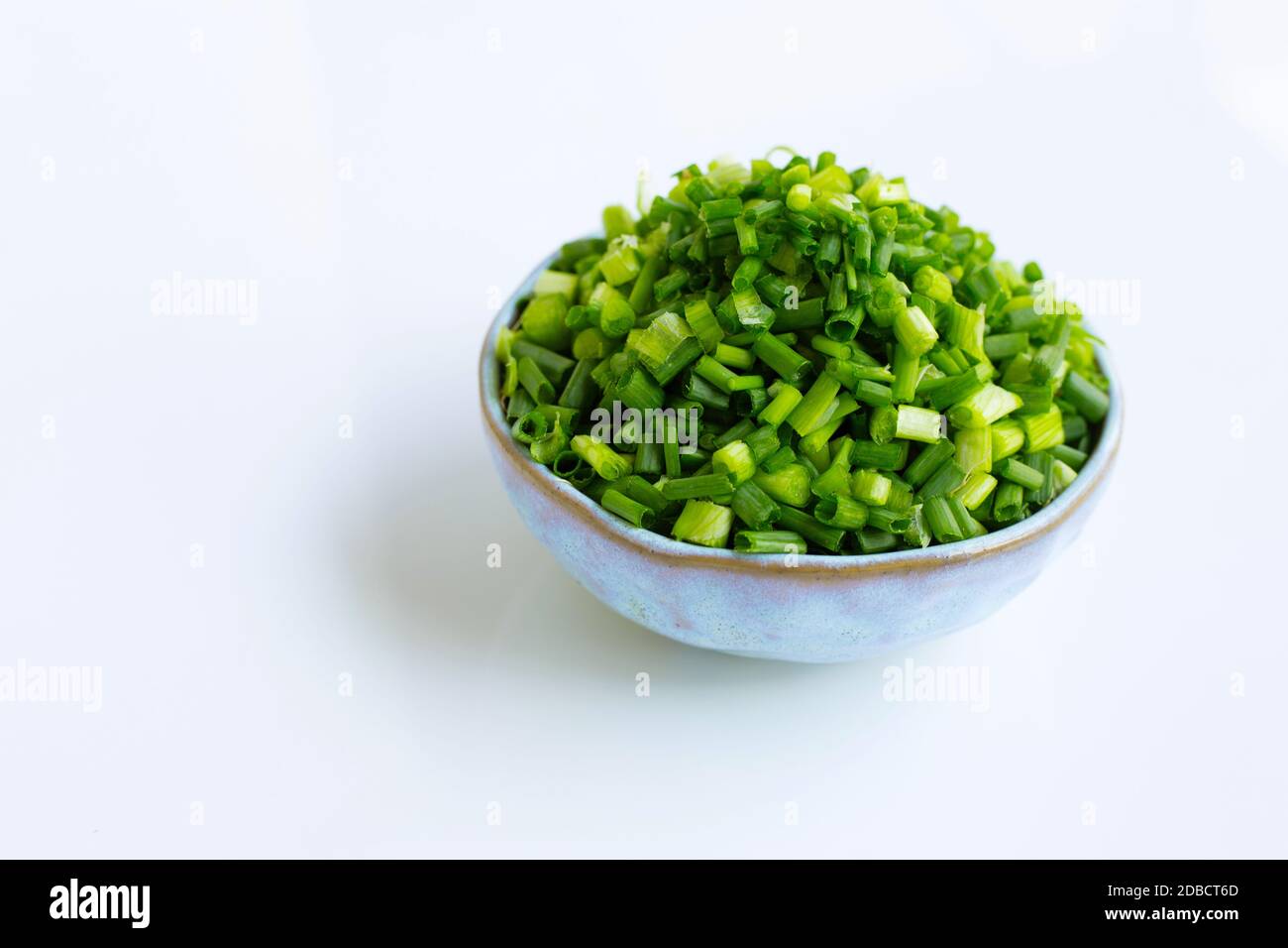 green onions isolated on white background Stock Photo - Alamy