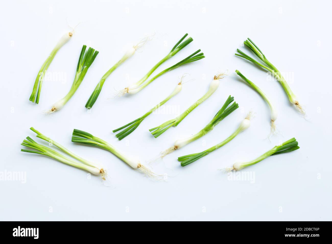 green onions isolated on white background Stock Photo - Alamy