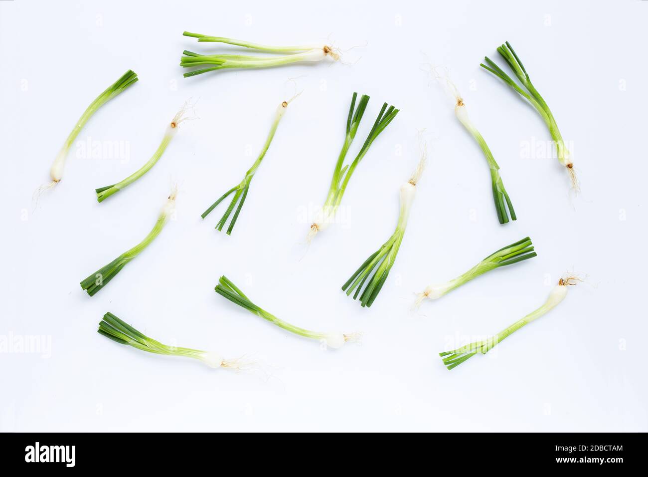 green onions isolated on white background Stock Photo - Alamy