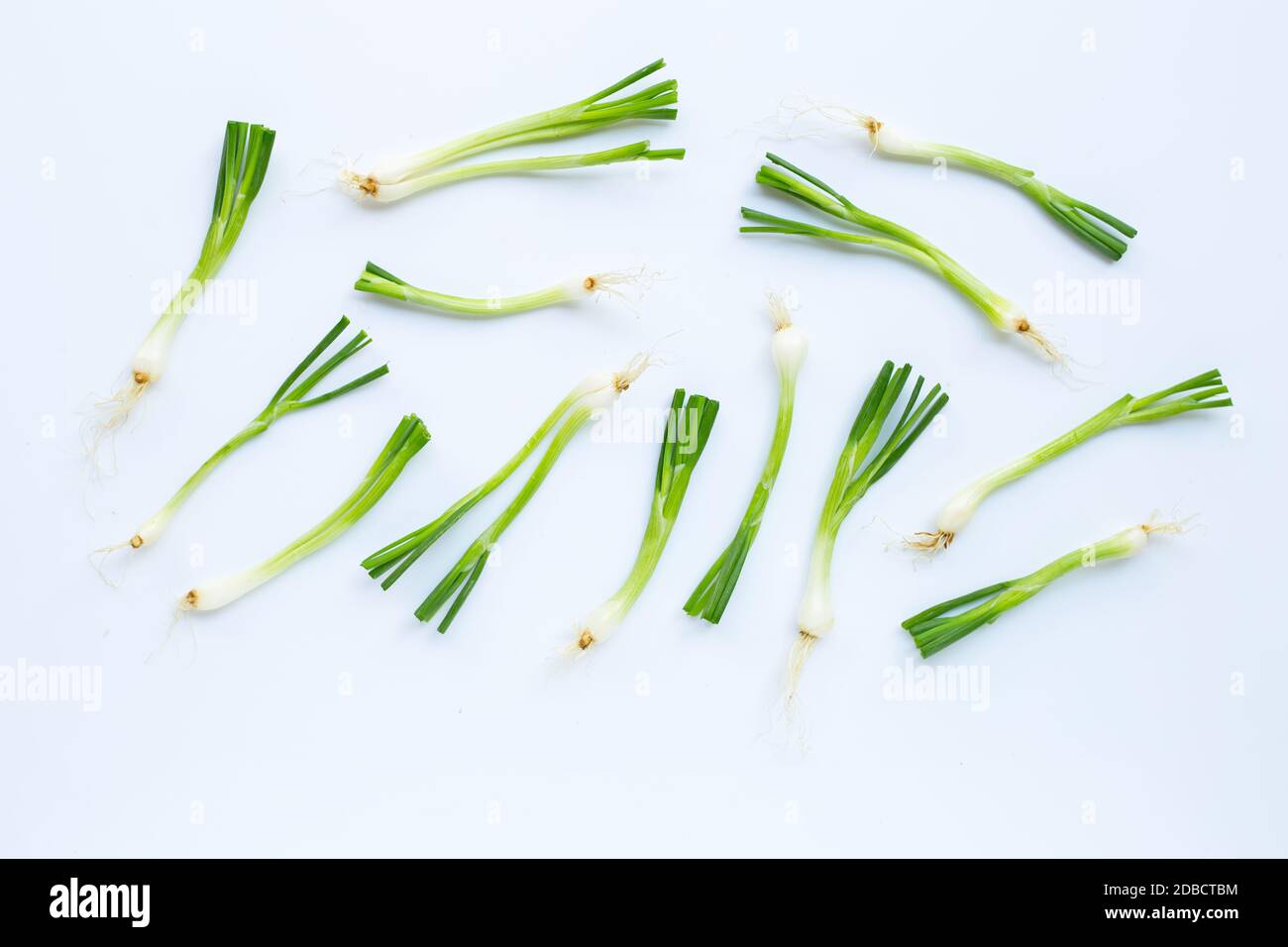 green onions isolated on white background Stock Photo - Alamy