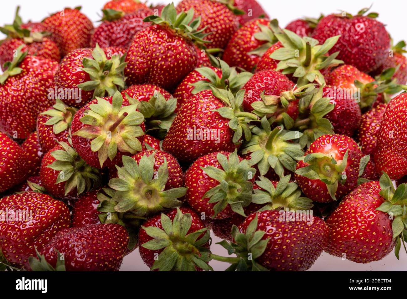 fresh ripe strawberries isolated on white background Stock Photo - Alamy