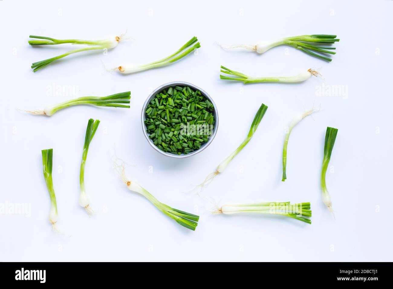 green onions isolated on white background Stock Photo - Alamy