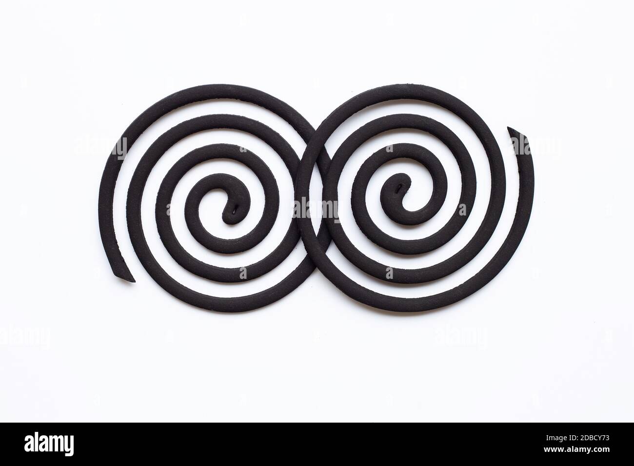 Black spiral Mosquito Repellent coils on white background Stock Photo