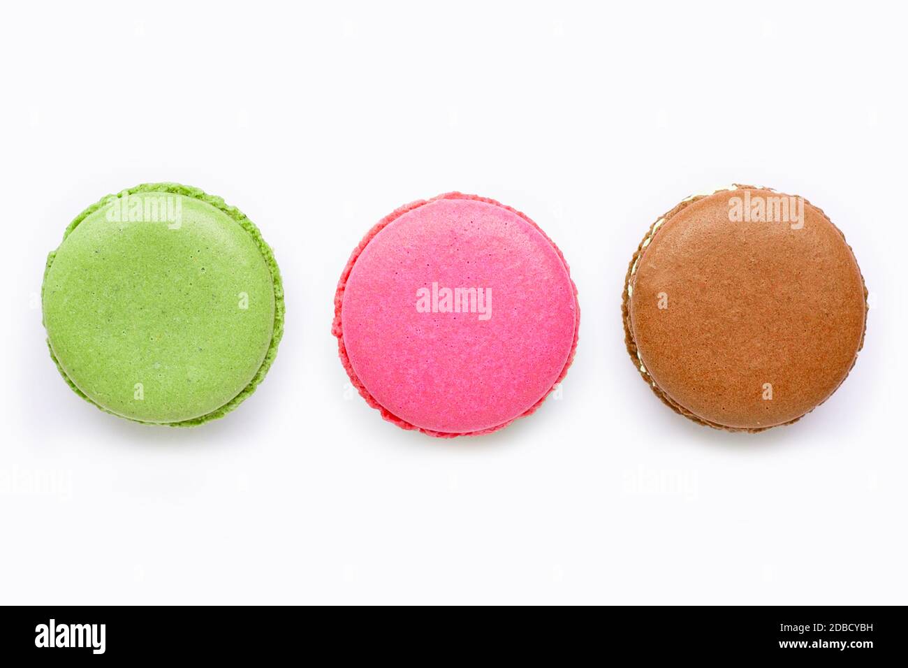 Colorful macarons isolated on white background. Stock Photo