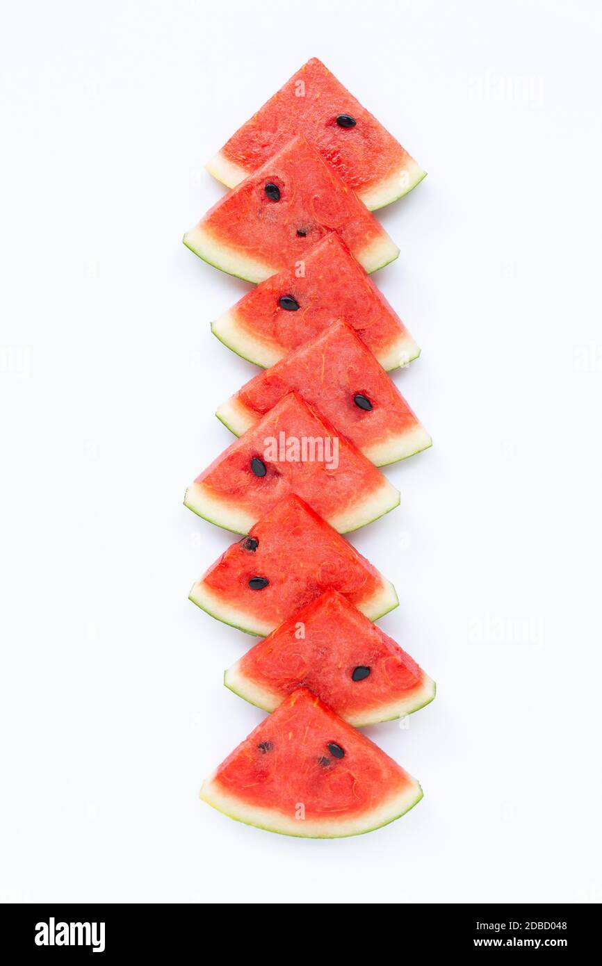 Watermelon pieces on white background Stock Photo - Alamy