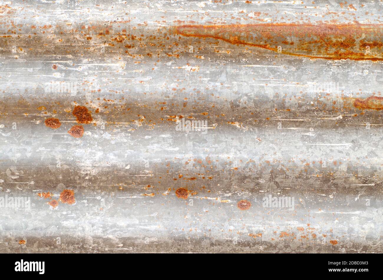 Full frame shot of galvanized sheet. Starting to rust. Stock Photo