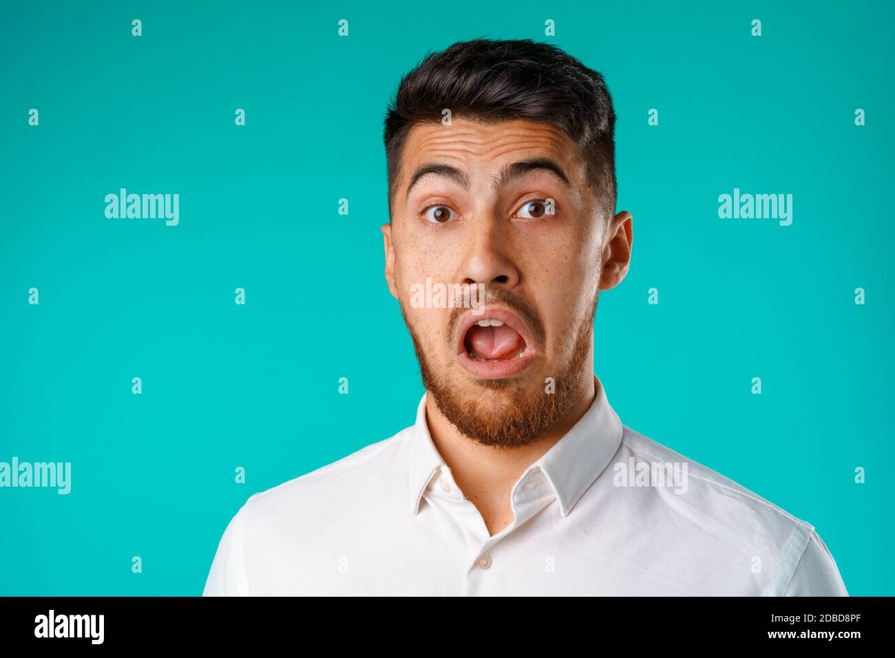 Amazed confused bearded young hi-res stock photography and images - Alamy