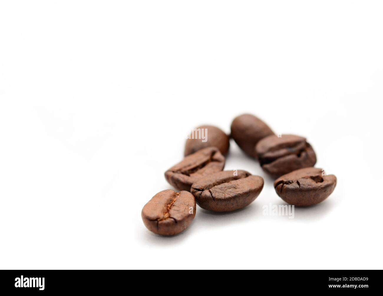 Group of coffee beans on white background with copy space on left Stock ...