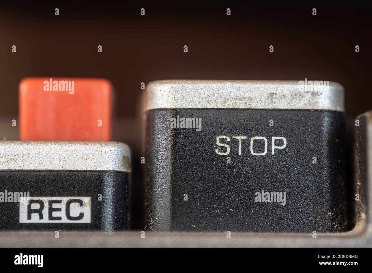 Close up of Rec and Stop buttons of a dirty old 1970s style cassette player radio Stock Photo