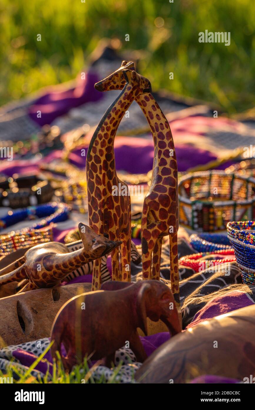 Two model giraffes for sale at market Stock Photo
