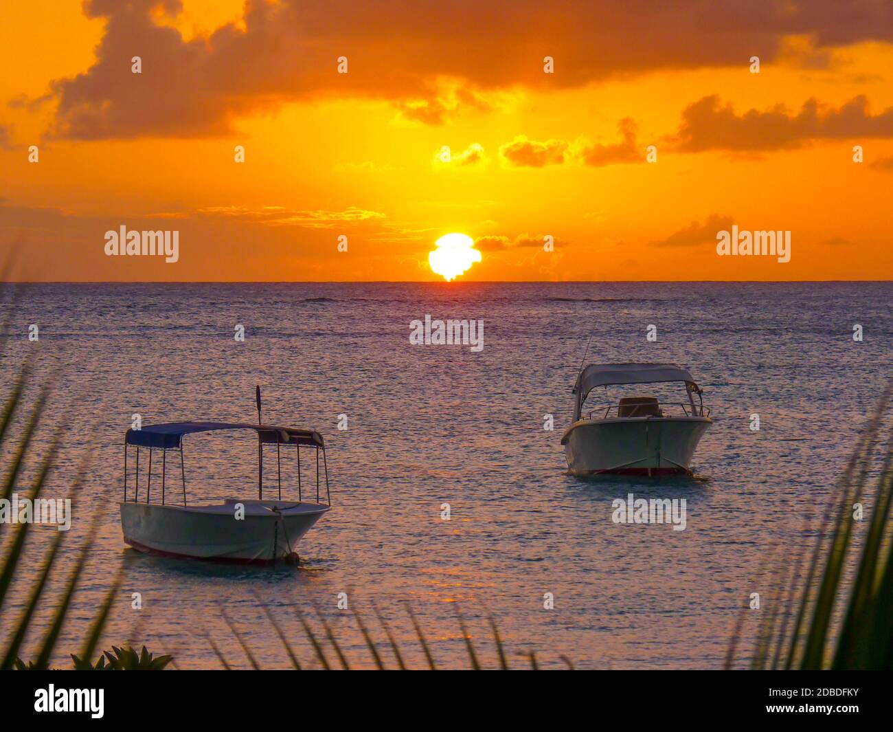 Sunset on the Indian Ocean in Grand Baie, Mauritius Island Stock Photo ...