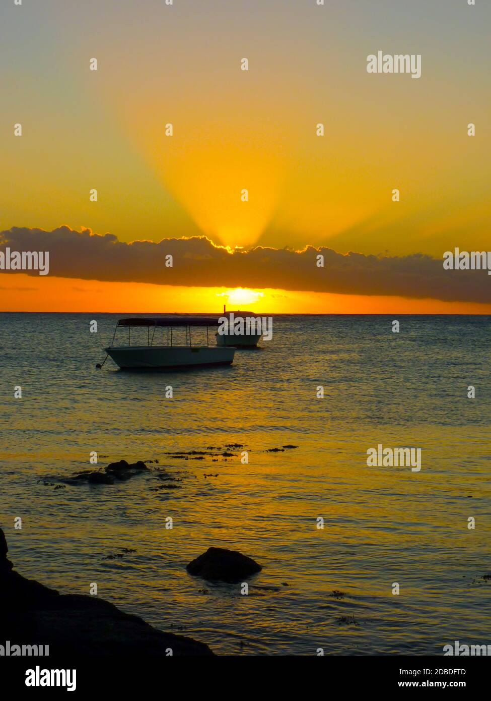 Sunset on the Indian Ocean in Grand Baie, Mauritius Island Stock Photo ...