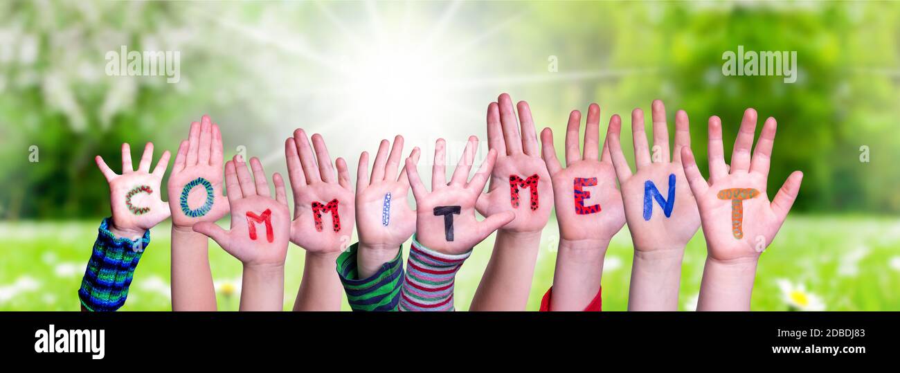 Children Hands Building Colorful Word Commitment. Sunny Green Grass ...