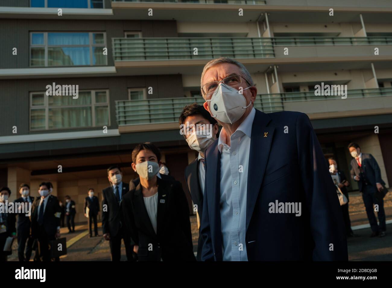 Tokyo Japan 17th Nov International Olympic Committee President Thomas Bach L Wearing A Protective Mask Talks To Journalists During A Visit Of Olympic And Paralympic Village On Downtown On November 17