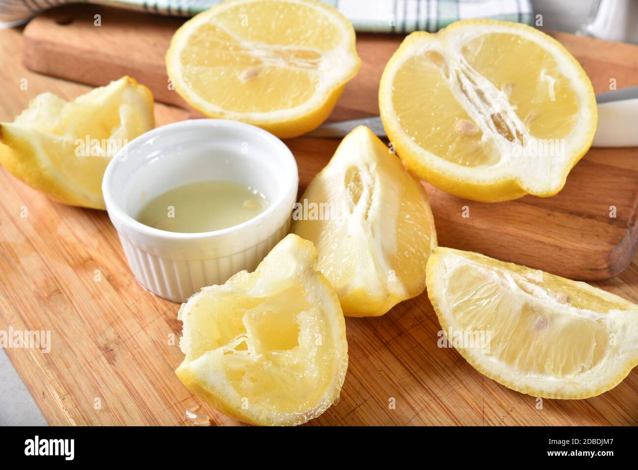 Fresh squeezed lemon juice in a small bowl Stock Photo Alamy
