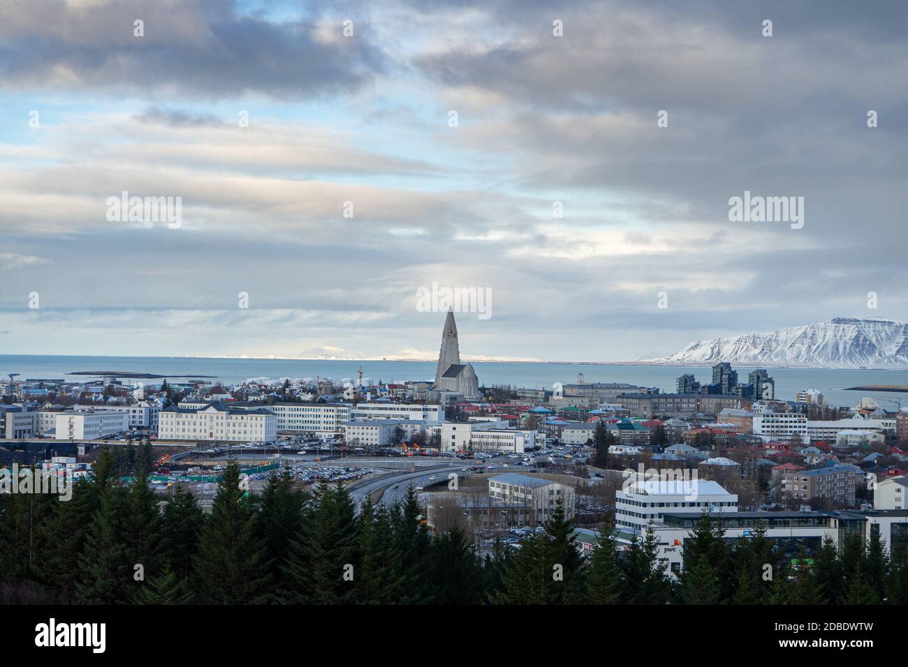 panorama shot in iceland the city of rekyavik with clouds and icebergs in the background Stock Photo