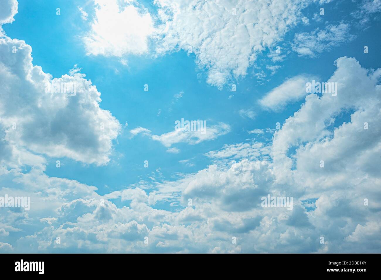 Blue sky with white clouds on a sunny day hi-res stock photography and ...