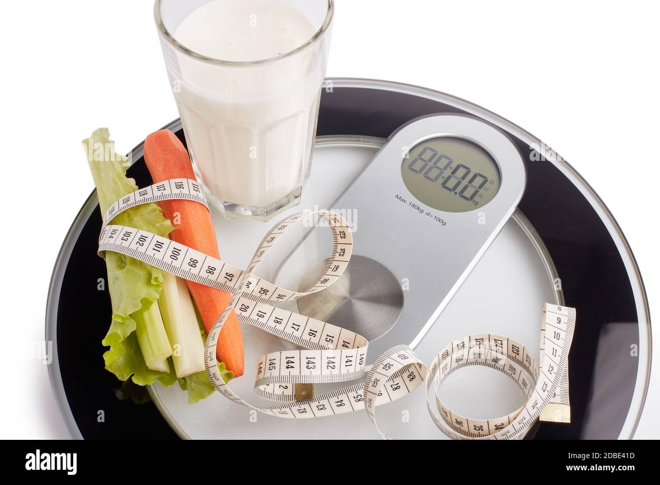 Slimming, diet, and control of weight. Still life with healthy food, scales and measuring tape
