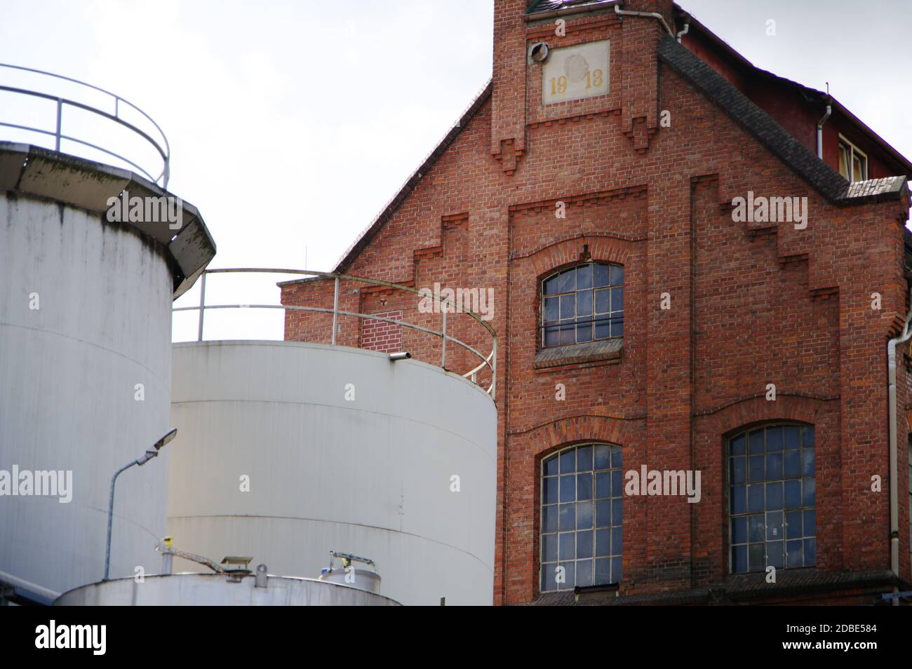 Chemical plant with modern production and old brick factory building Stock Photo