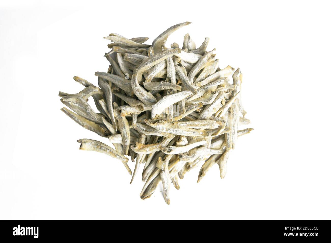 Dried salted anchovies isolated on white background. Snack Fish to beer. Close up. Stock Photo