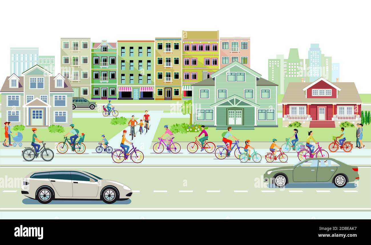 Cyclists on the bike path and road traffic with pedestrians and cars on ...
