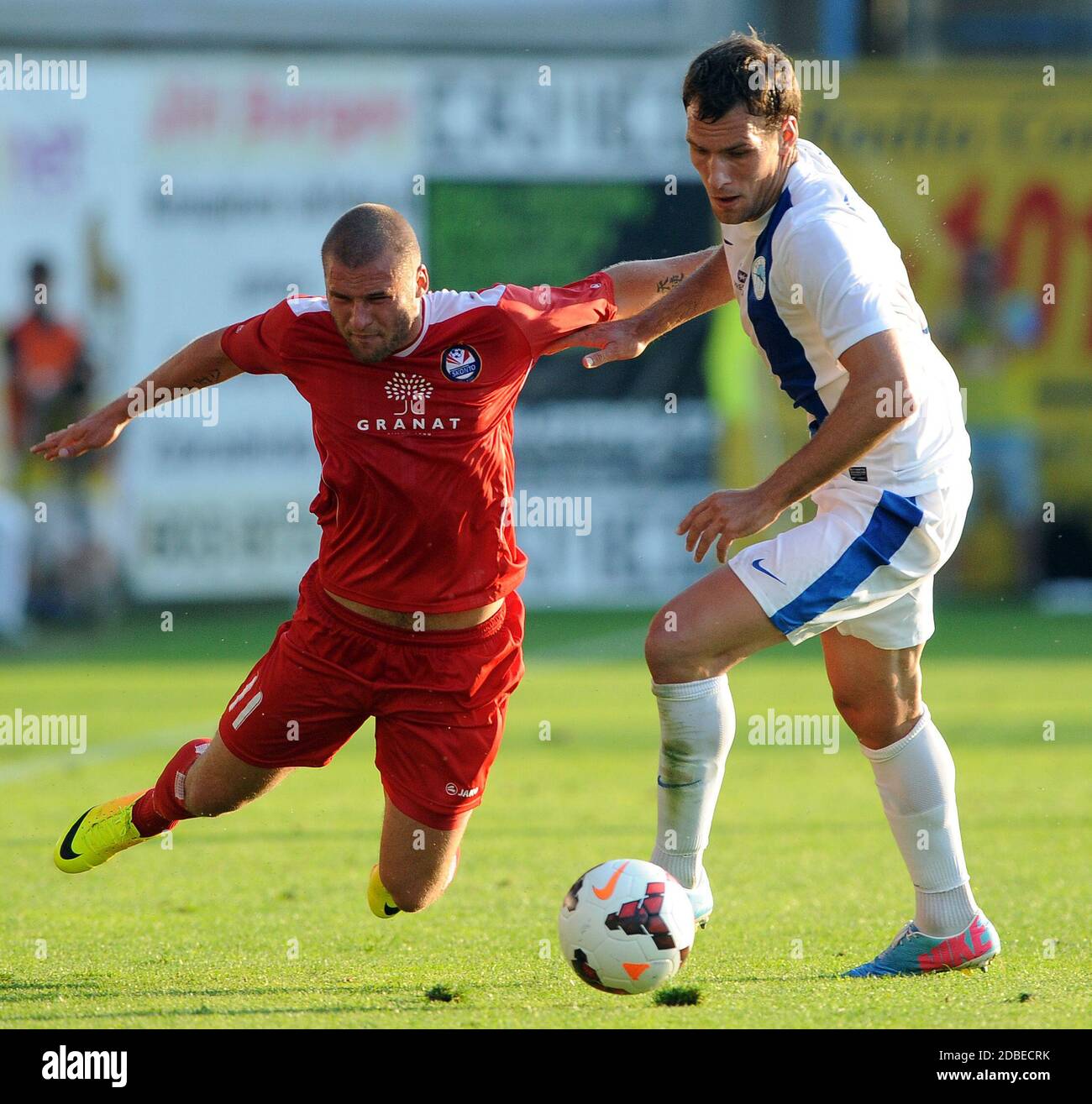 Liberec, Czech Republic. 25th July, 2013. The European Football League, 2nd qualifying round, FC Slovan Liberec vs FC Skonto Riga, 1:0, Liberec, Czech Republic, on Thursday, July 25, 2013. Michale Rabusic of Slovan Liberec (R) and Alans Sinelnikovs of Skonto Riga. *** Local Caption Credit: Slavek Ruta/ZUMA Wire/Alamy Live News Stock Photo