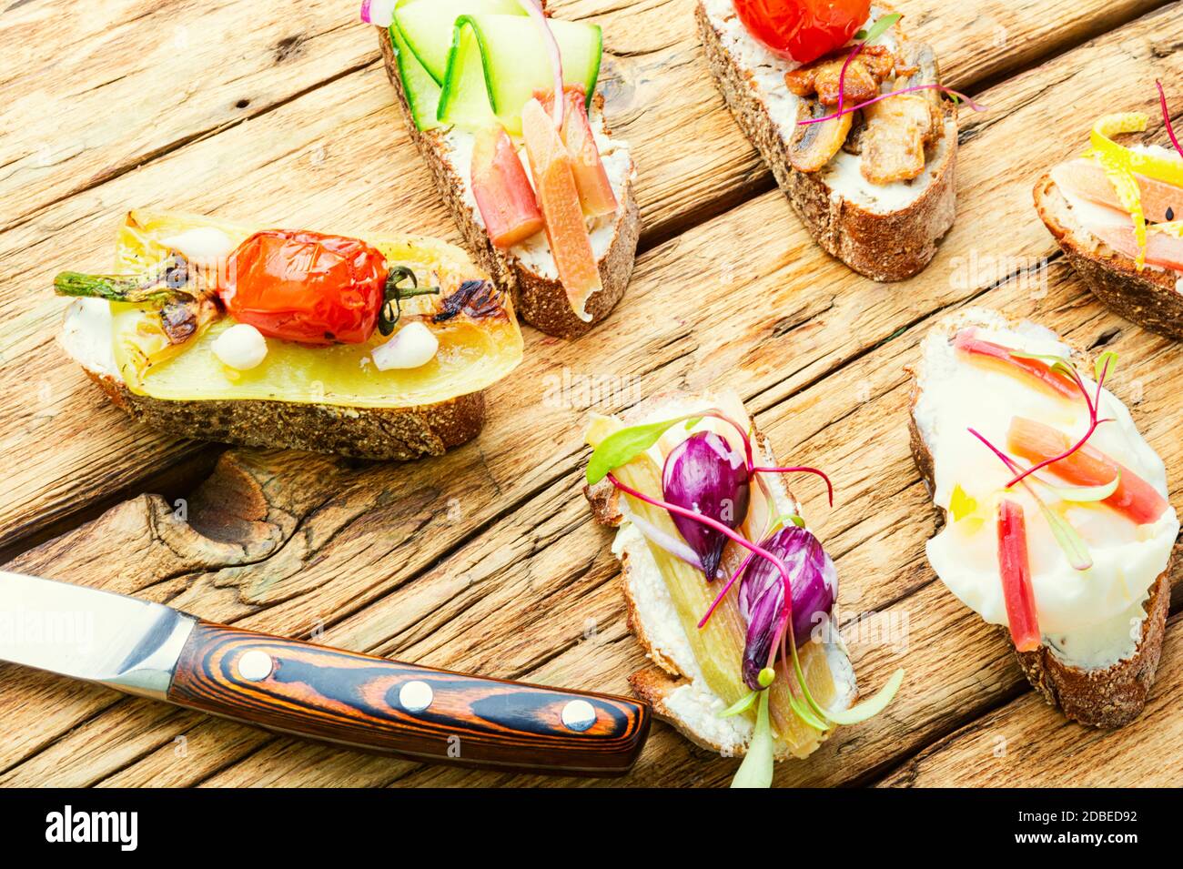 Set of delicious Italian bruschettas with grilled vegetables.Bruschetta or canape Stock Photo