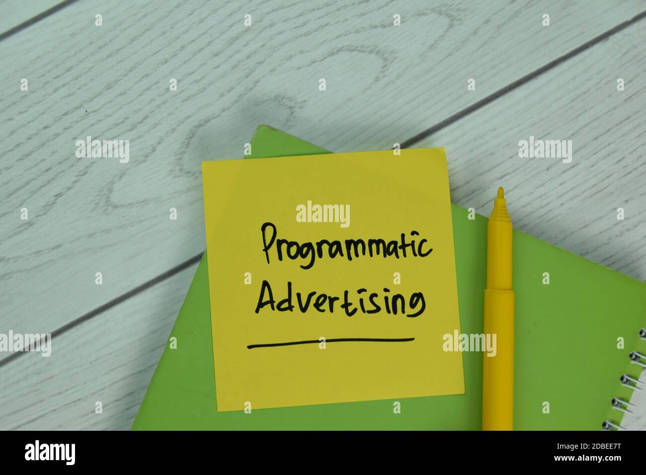 Programmatic Advertising text on sticky notes isolated on office desk Stock Photo