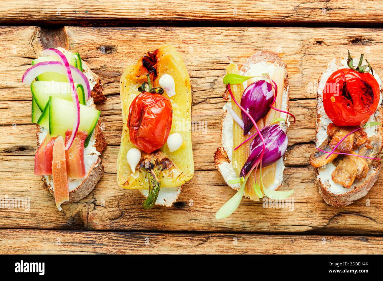 Set of delicious Italian bruschetta with grilled vegetables.Bruschetta or canape Stock Photo