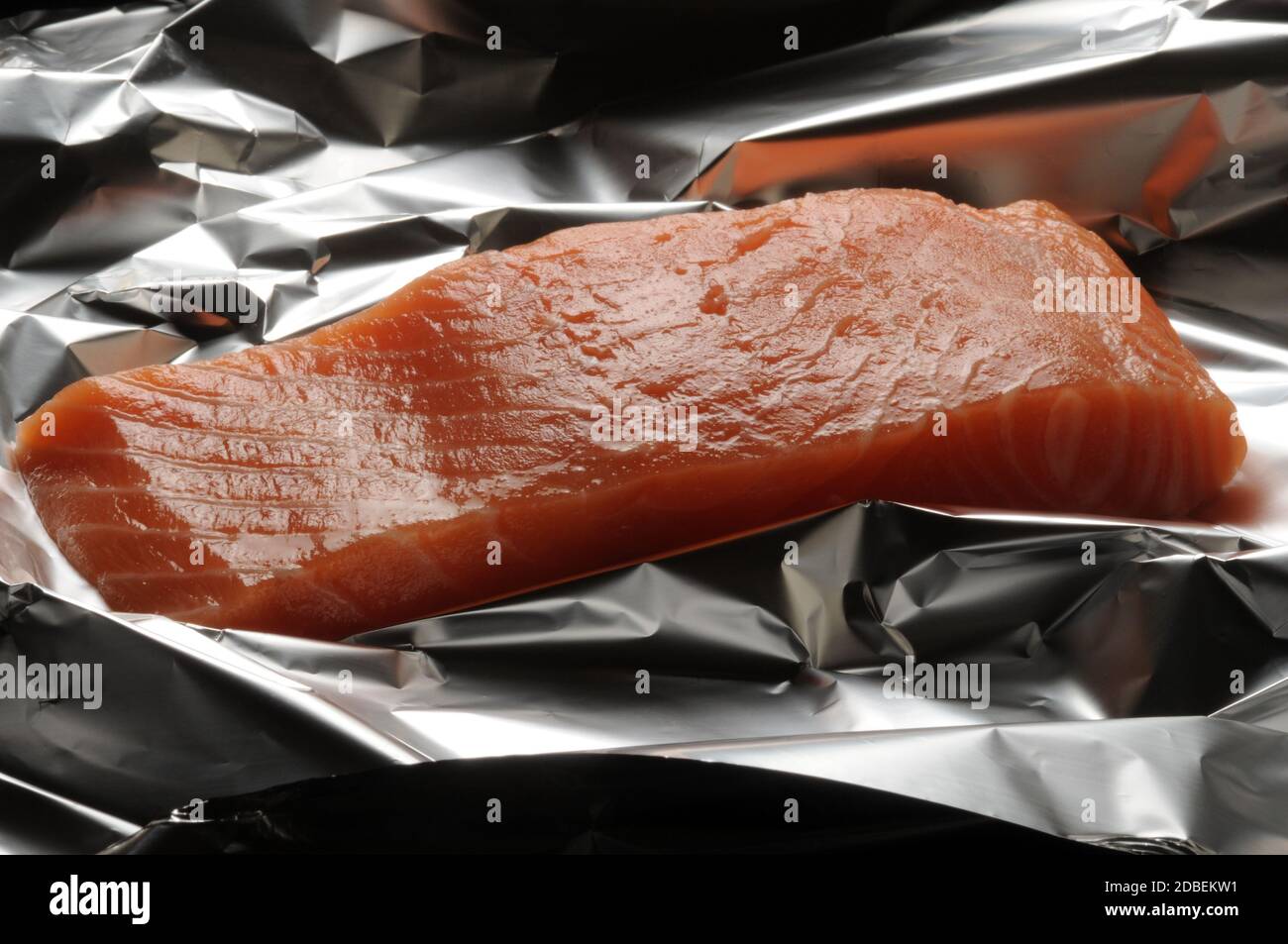 Salmon fillet in foil Stock Photo - Alamy