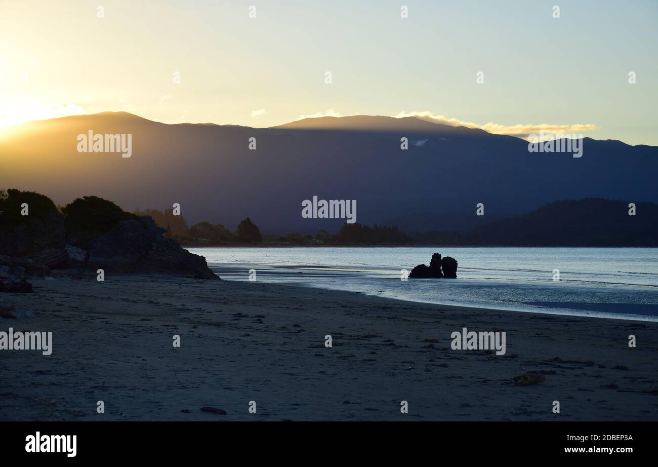 Sunset at Pohara Beach, Golden Bay, New Zealand, South Island. The ...