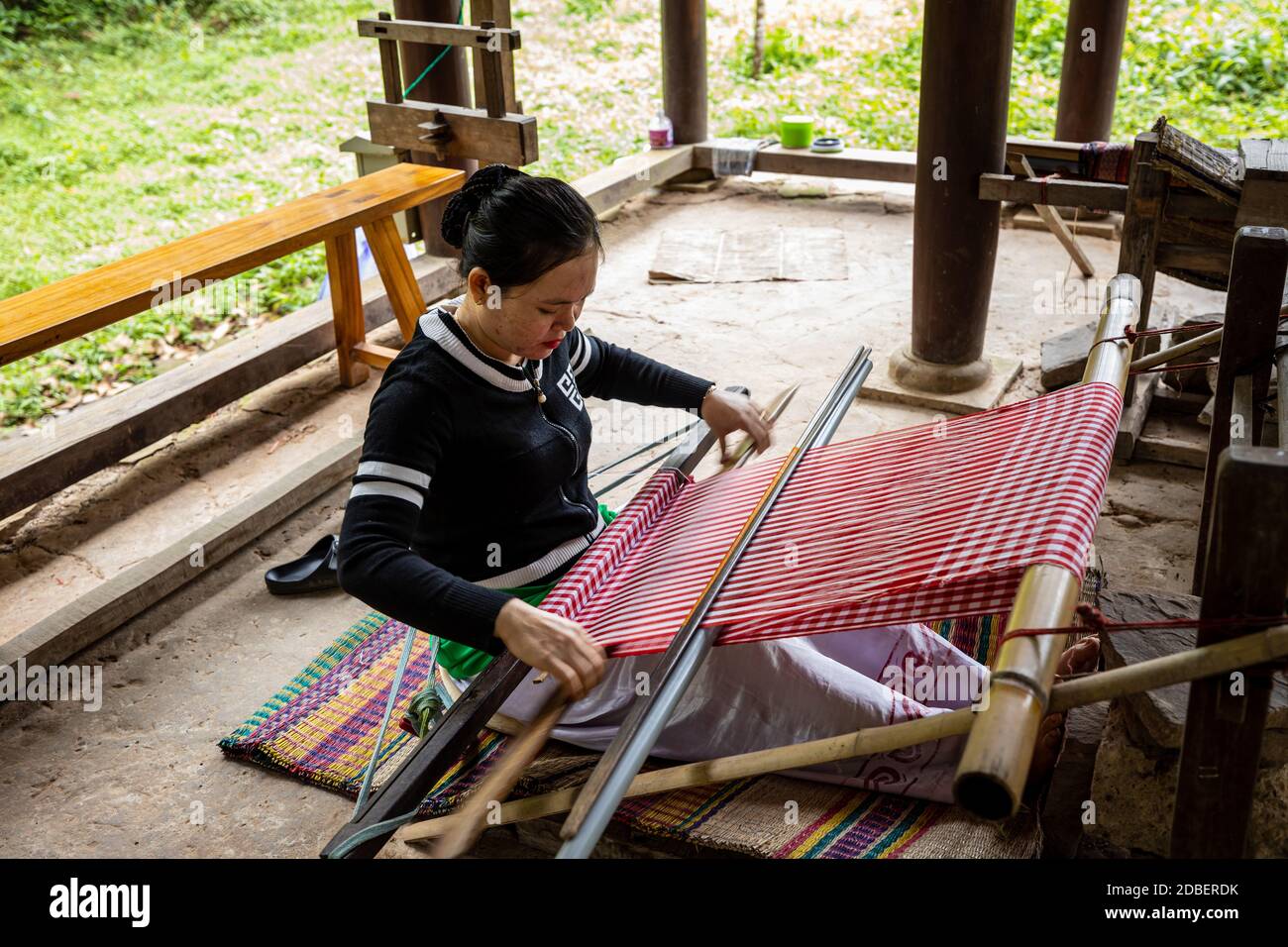 woman on a weaving loom in vietnam Stock Photo