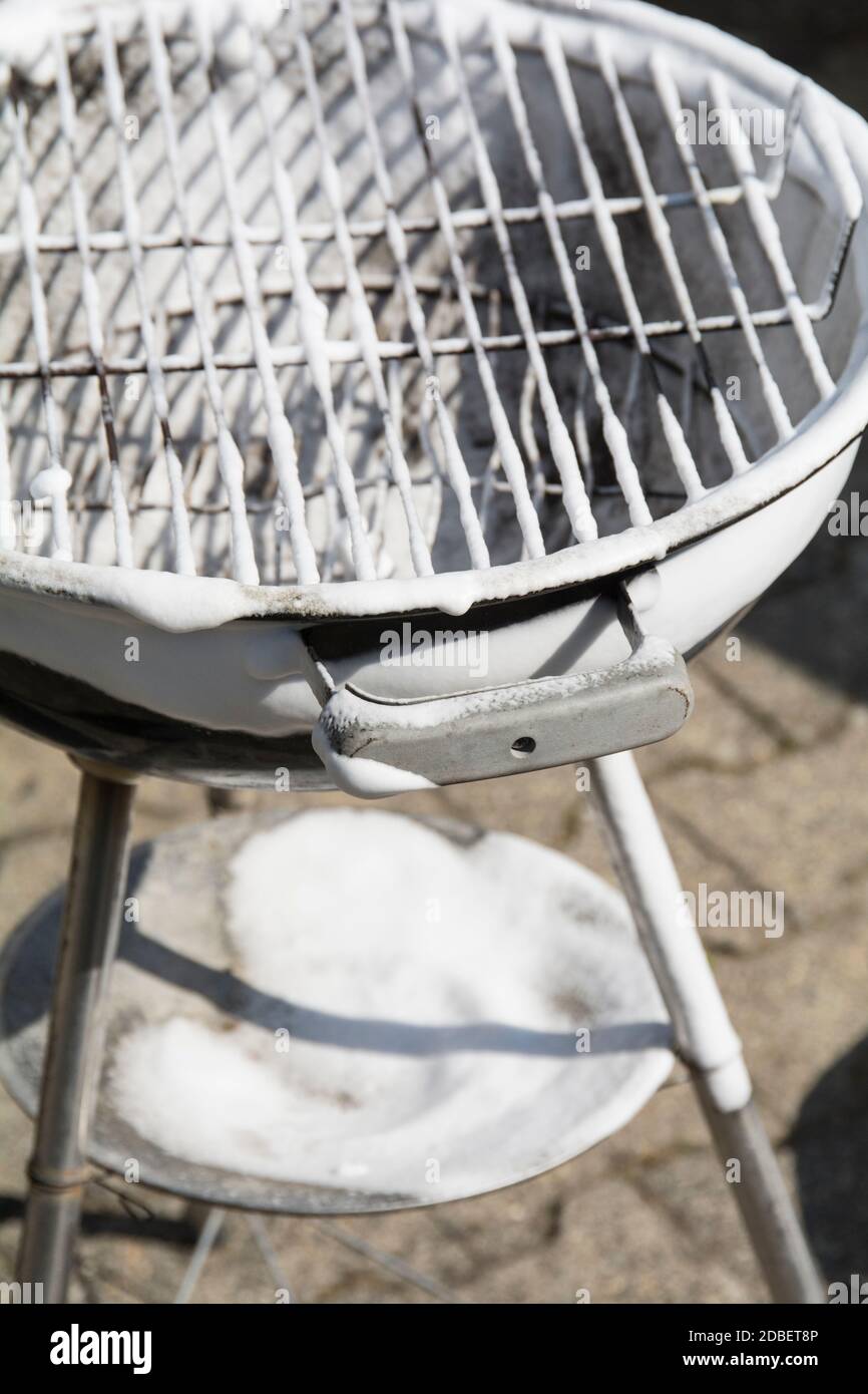 charcoal grill cleaning Stock Photo