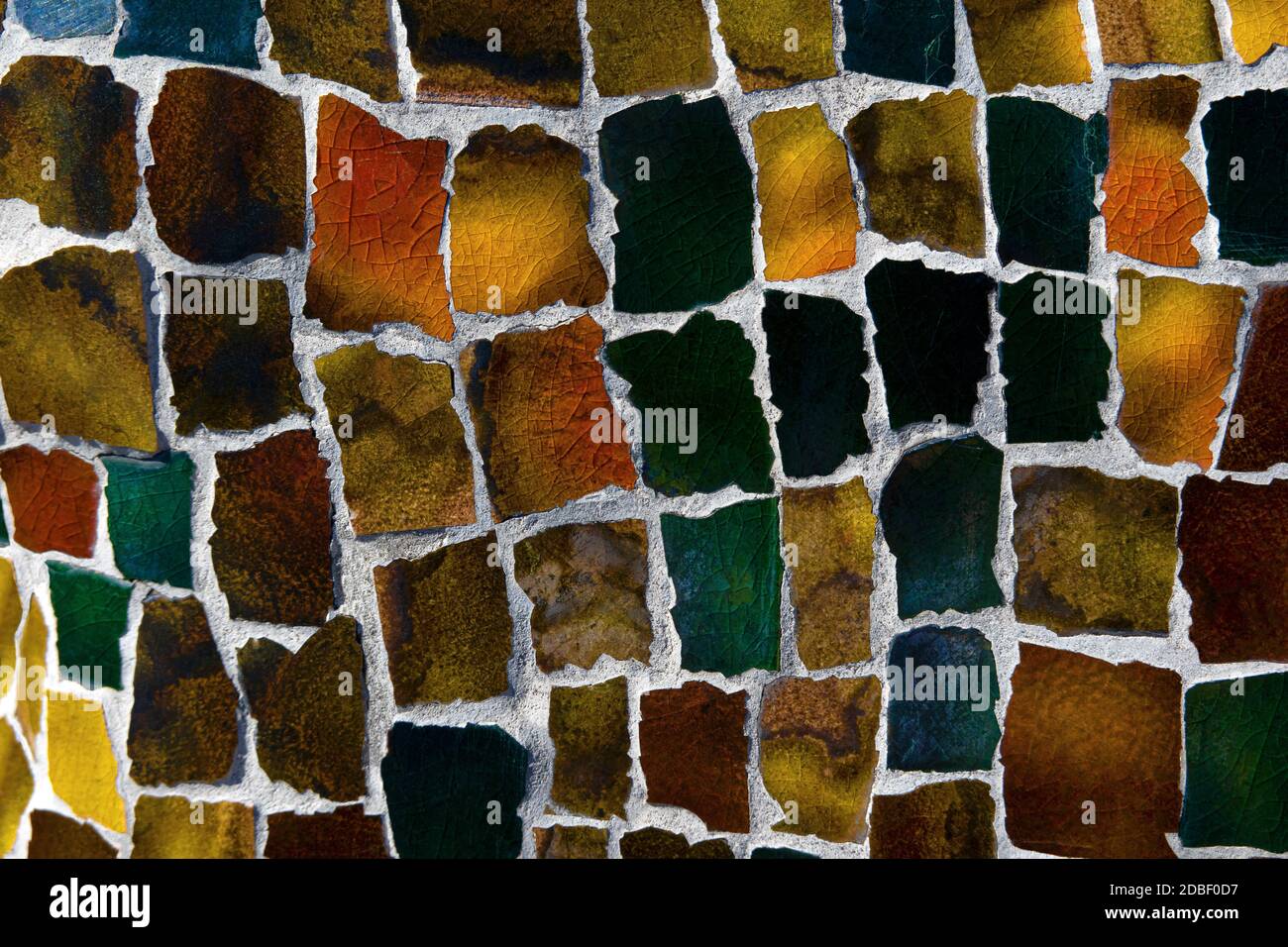 Mosaic of colored, roughly broken, square pieces of tile Stock Photo