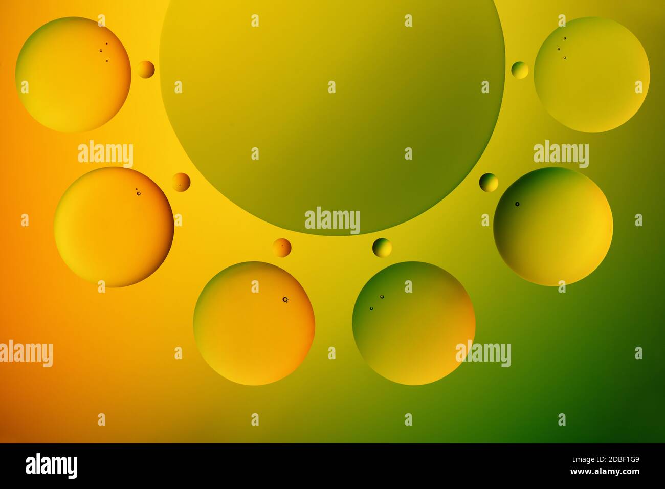 Multicolored decorative circles on bright gradient background. Stock Photo