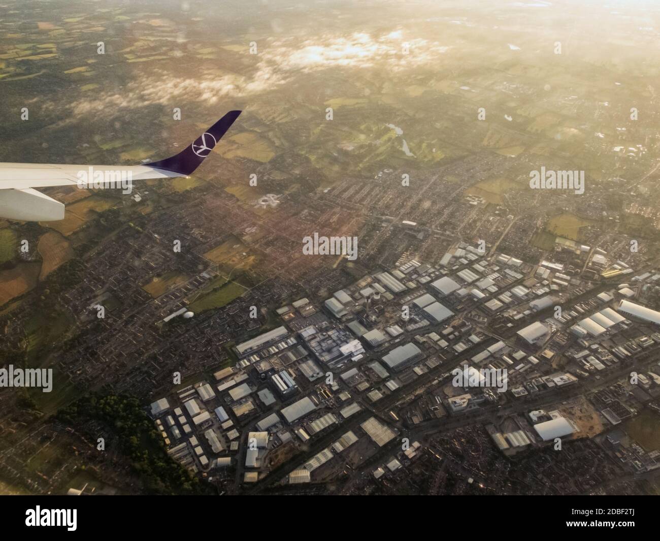LOT Airlines B737-800 takes off from London Heathrow to Warsaw,Poland as viewed from right hand passenger cabin window on a morning flight. Stock Photo